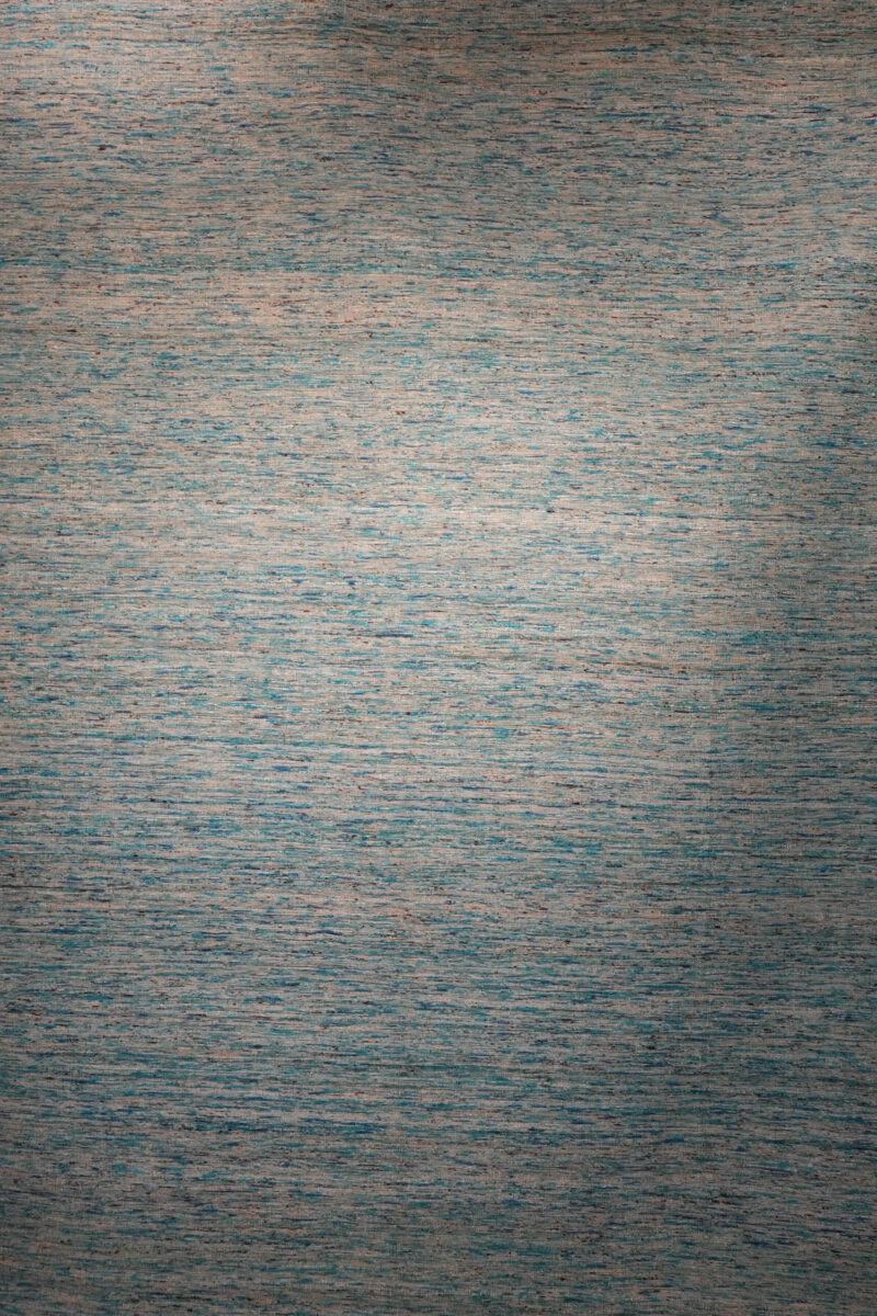 teal and grey hand-knotted area rug