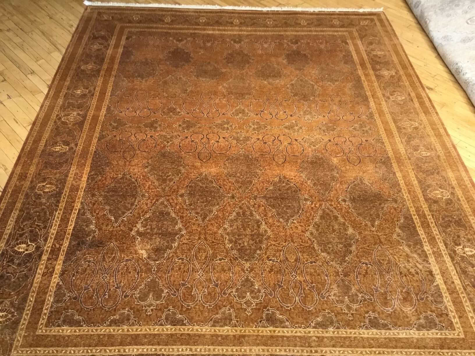Gold rug after fringe restoration